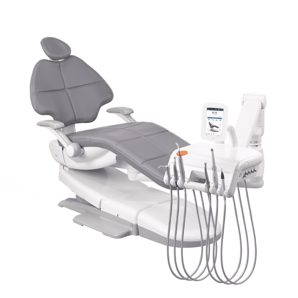 zeigt einen Zahnarztstuhl mit Hängeschläuchen, der Stuhl ist grau